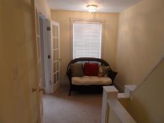 The hallway on the second floor offers some bonus space which is well lit from the large window.