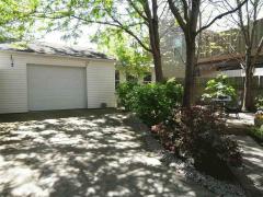 This is a tremendous garage with room for multiple vehicles and storage above. It is finished and painted.