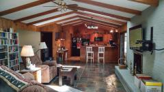 Huge great room with woodburning masonry, brick fireplace (electric insert stays) Very open floorplan!