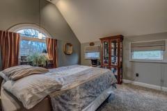 Cathedral Ceilings! Look at that gorgeous window, so much charm in this home.
