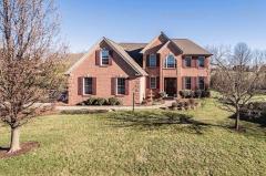 Professional landscaping. Lots of blooming trees. New front outdoor lighting. Fountain does not stay.
