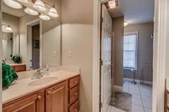 Your children won't mind sharing. Two separate sinks. Jack and Jill setup. Pocket door. Another door will separate the shower/tub for privacy.