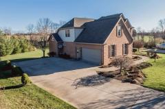 Oversized garage with ample parking space for your company. Access door into garage.