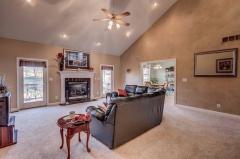 Unique setting..two doors to go out to your deck. Beautiful mantle with gas fireplace and marble trim.