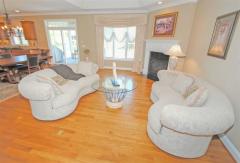 Living room features handsome fireplace
