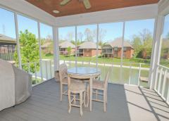 Private screened deck is perfect for outdoor entertaining