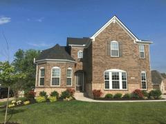 Drees Mason floor plan with 3 car garage and finished lower level.
