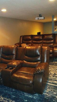 Seller is leaving the projector and theater furniture!