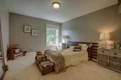 with walk-in closet and view of the woods!