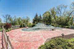 Beach entry heated gunite pool with waterfall! Enjoy your summer here for any occasion!