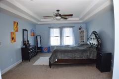 Extended master suite w/ tray ceiling, his and her walk in closets & deluxe master bath!