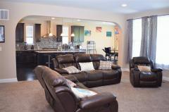 The great room flows into the kitchen and breakfast room, perfect for entertaining!