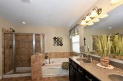 You'll love the tiled Master Bath with Soaking Tub, Large Shower, Double Vanity and Large Walk-in Closet with Deluxe organization system.
