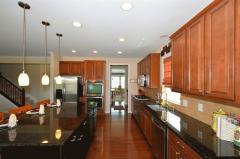 If you entertain or just love to cook, this home features a kitchen any chef would adore. Inviting oversize island doubles as a counter/bar and the granite gleams with the stainless appliances.