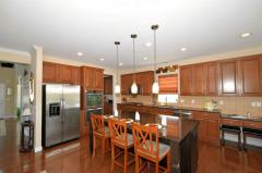 Stainless Appliances, gleaming granite, huge Island, plenty of workspace. You will love this kitchen!