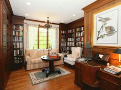 Stunning built ins in this gorgeous library with overlook onto first floor and views of the Ohio River.