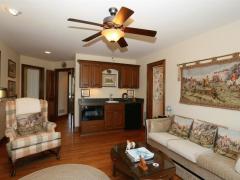 Just one of the magnificent third floor suites. This one features family room area with balcony overlooking the river.
