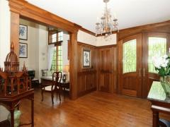 The woodwork is one of a kind featuring lumber harvested from the homesite.