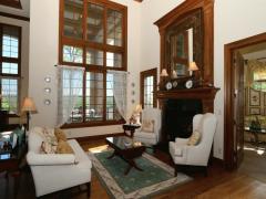 The first of many gorgeous fireplaces in this home graces this first floor living room.