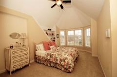 Inviting Bedroom with Fairy-like Ceiling and built-in bookcase.