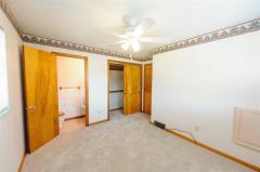 Has partial bath, new vinyl wood plank floors, & ceiling fan.