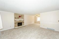Lower Level Family Room with FP. Unknown if functioning. This Owner never used it, and said nor did prior owner before this owner. Walk out to garage, laundry, HVAC systems, and yard.