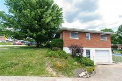 Beautiful mature landscaping surrounds home and back yard.
