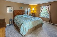 Master suite w/ adjoining master bath & walk-in closet.