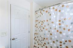 Tub w/ Shower in adjoining master bath.