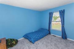 3rd bedroom w/ new carpet & large window.
