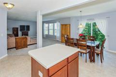 Open floor plan with a nice flow from the kitchen & breakfast room into the family room. Large windows for lots of natural lighting. Brand new carpet & freshly painted interior!