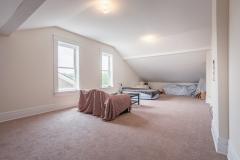 Just add a closet and this loft would be a massive master suite. Without the closet enjoy a very spacious family room with vaulted ceilings and plenty of natural light!