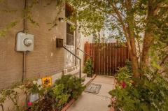 Lovely shade tree makes for a stunning entrance to the home