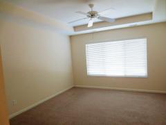 Master bedroom features a decorative tray ceiling and plenty of wall space to accommodate the largest of bedroom sets!