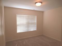 Offering valued privacy, the second/guest bedroom is located at the opposite end of the house from the master bedroom!
