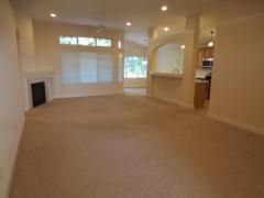 Abundance of cheerful transom windows, all with wood Hunter Douglas blinds!