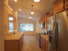 Abundance of raised panel, multi-height maple cabinets!