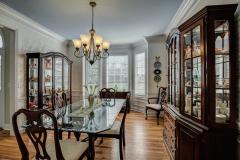 Dining room features chair rail and crown molding