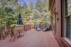 Low maintenance exterior with Trex deck and full brick wrap