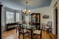 Formal dining room features lovely bay area