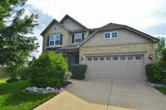 New California Frize Carpet*Custom Tiled Backsplash*Custom Stone Accent Columns/Wall in Dining Rm*Epoxy Finished Garage & Basement Floors*Lots of Custom Trims/Crowns/Wainscotting Added * Shows Like a Dream! Area of Much Higher Priced Homes!
