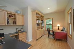 Hardwood Floors and Built in Bookcases in Study.