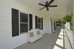Two Ceiling Fans help cool the Expansive Front Porch.