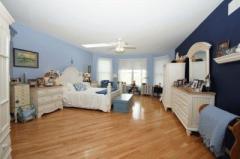 This is a Master Bedroom! Large enough for any size furniture and separated from the rest of the home it offers you the privacy you deserve at the end of the day. Giant size closet is large enough for a dressing area, walk-out to the screened porch.