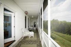 You'll overlook the acreage from the screened porch with access from the Master Bedroom or Kitchen.