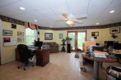Currently used as a law office with its own walkout door. It also has a large closet used as a law library.