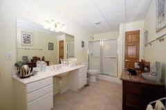 The Full bath includes a tiled shower and floor. You can access it from the hall or future bedroom.