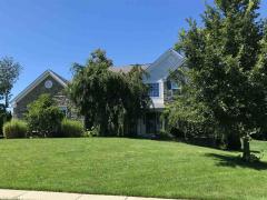 To keep the hot sun off the front of the house, the owner has added Wheeping Cherry Trees. This 5 br,3.5 bath home has over 3400 sq feet of living space on just 2 levels. Imagine how much more room you can have when the basement is finished.New carpet!!