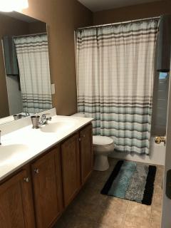 This is one of two full baths the owners added upstairs from the original floor plan