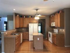 All the appliances will stay in this wonderful eat in kitchen that overlooks the family room. Plenty of cabinets and counter space.